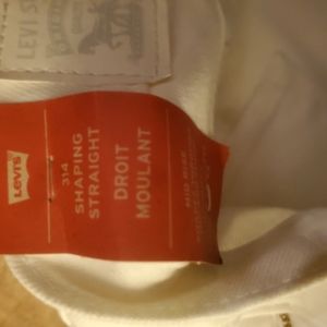 White 314 levis shaping straight leg jeans